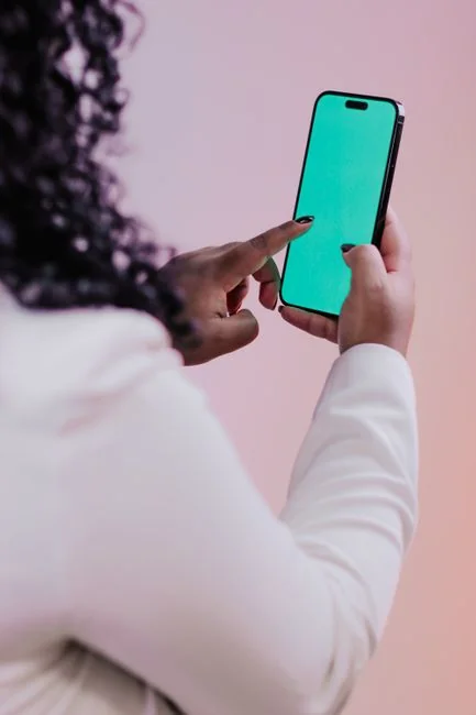 A focused designer works on a user-centric project in a modern office environment.